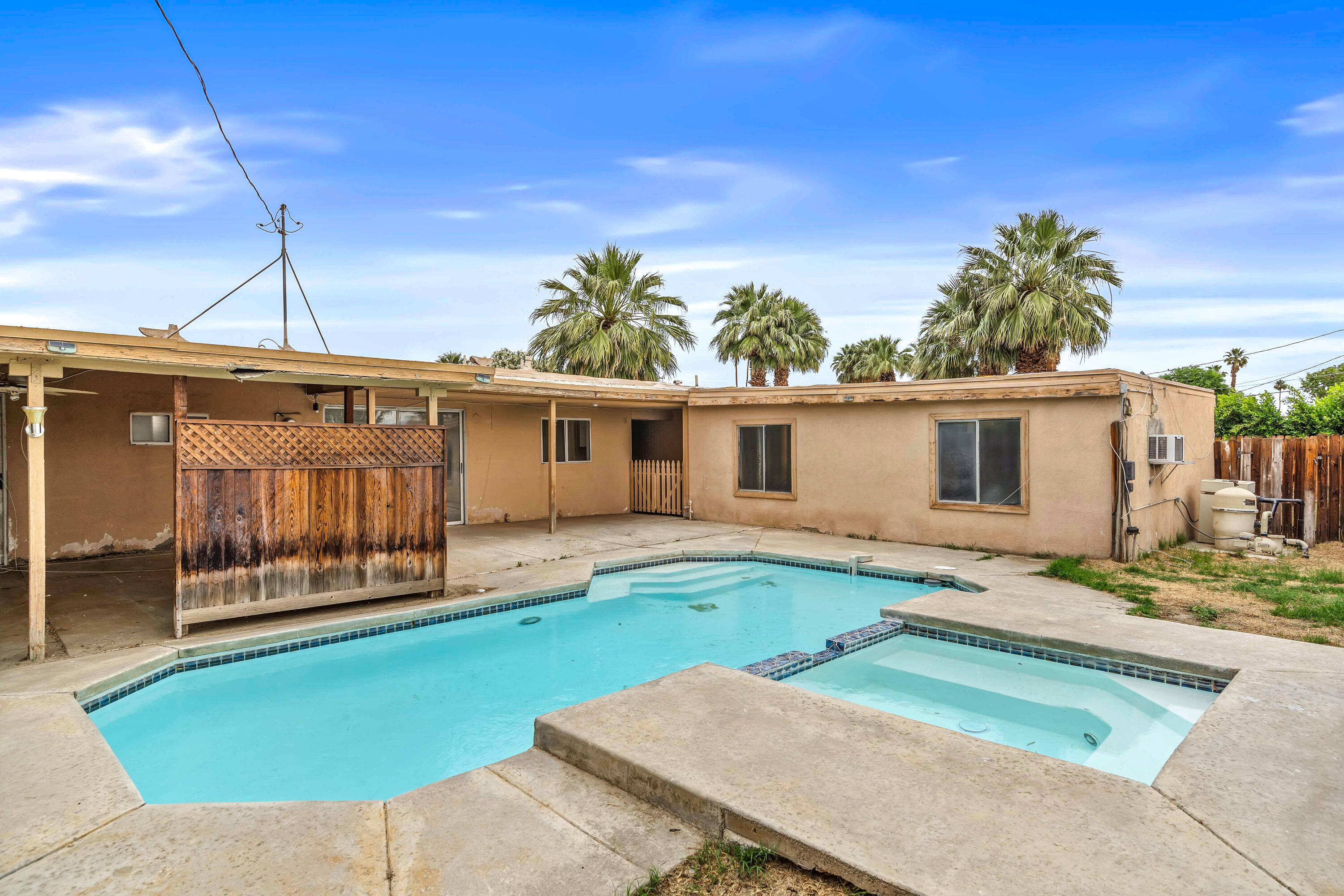 43831 Joshua Road Palm Desert, CA 92260 - Photo 22 of 42 a view of a house with backyard and sitting area