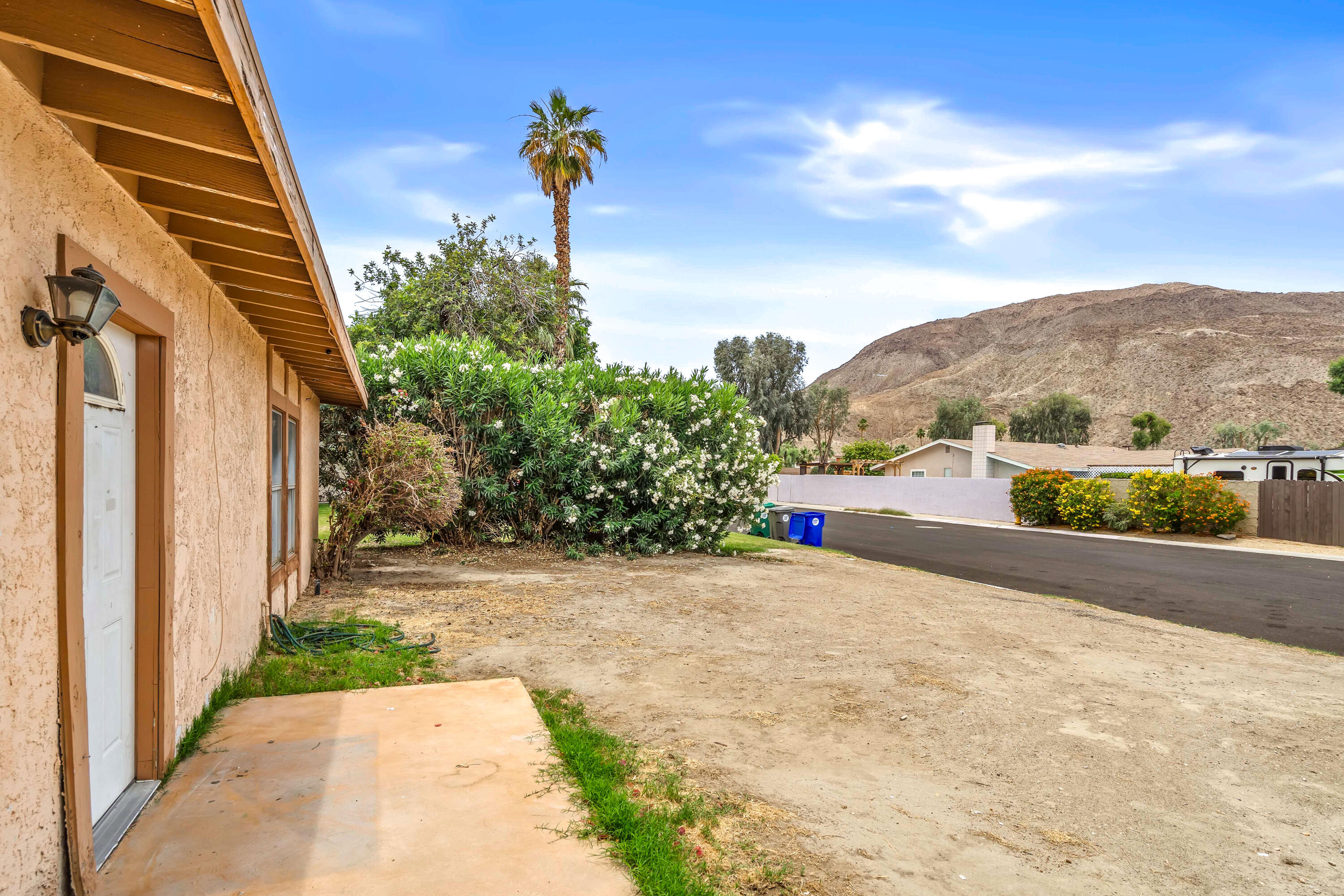 43831 Joshua Road Palm Desert, CA 92260 - Photo 42 of 42 a view of a backyard with pathway