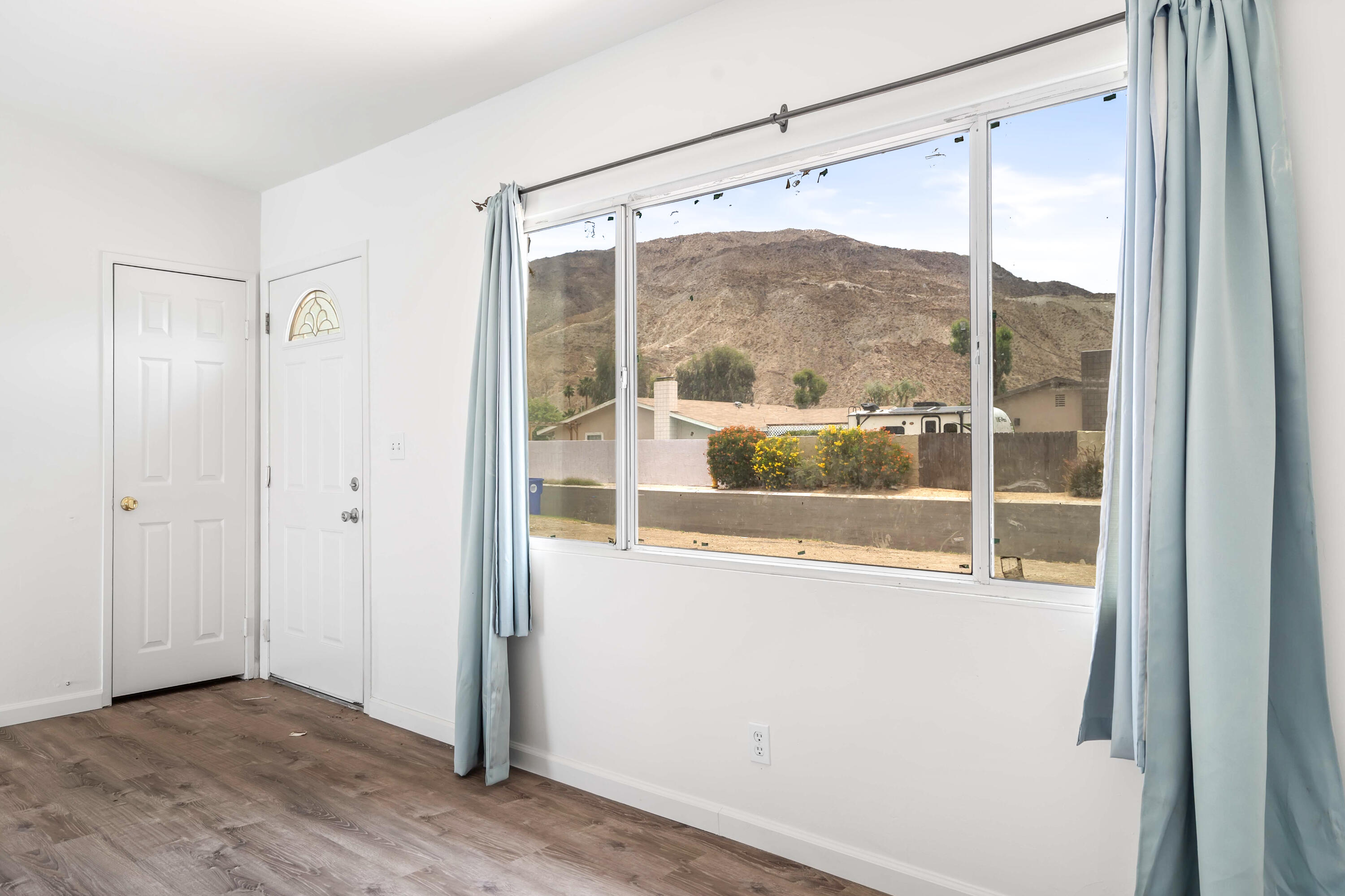 43831 Joshua Road Palm Desert, CA 92260 - Photo 6 of 42 a view of a glass door with a glass door