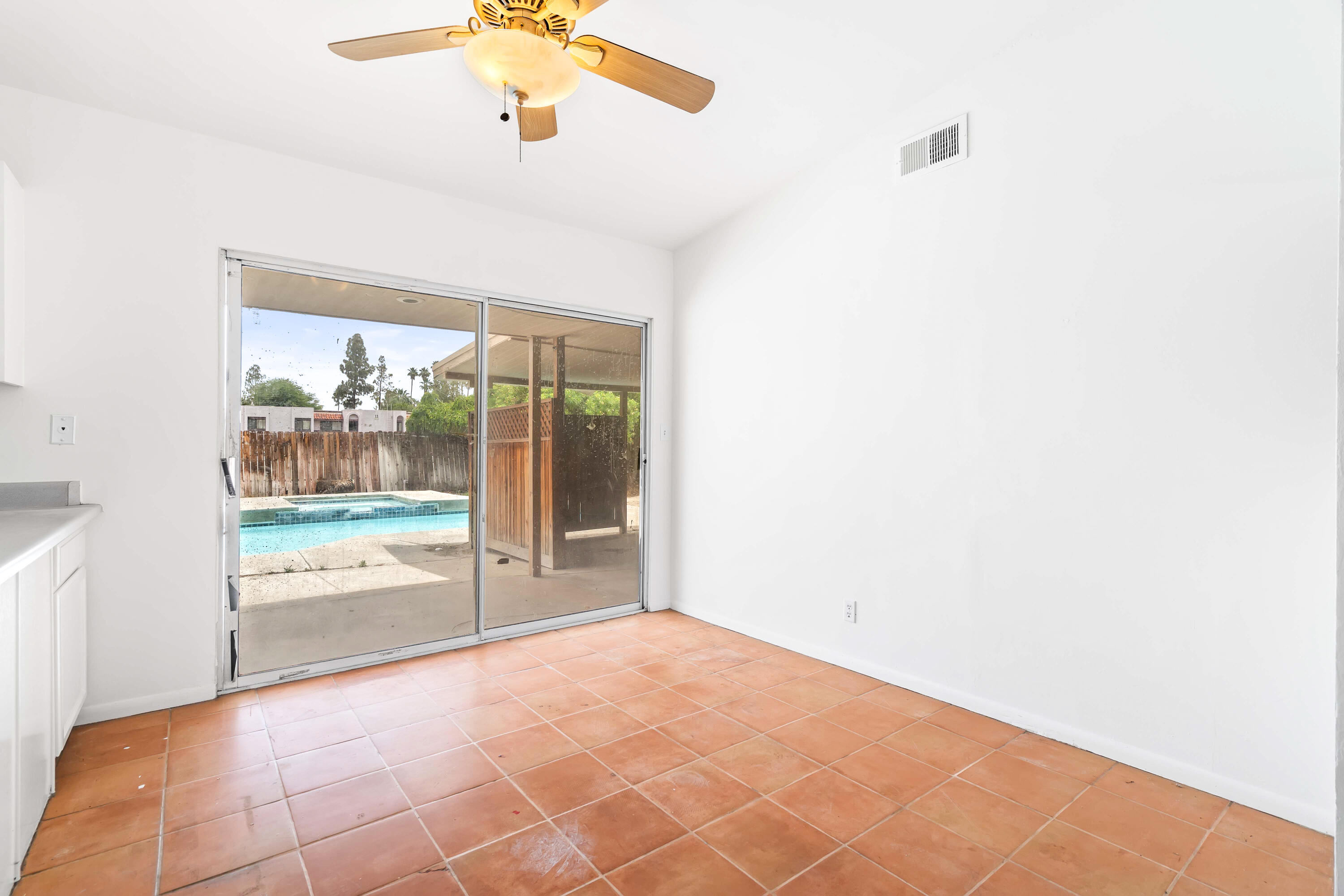 43831 Joshua Road Palm Desert, CA 92260 - Photo 7 of 42 a view of an empty room with a window