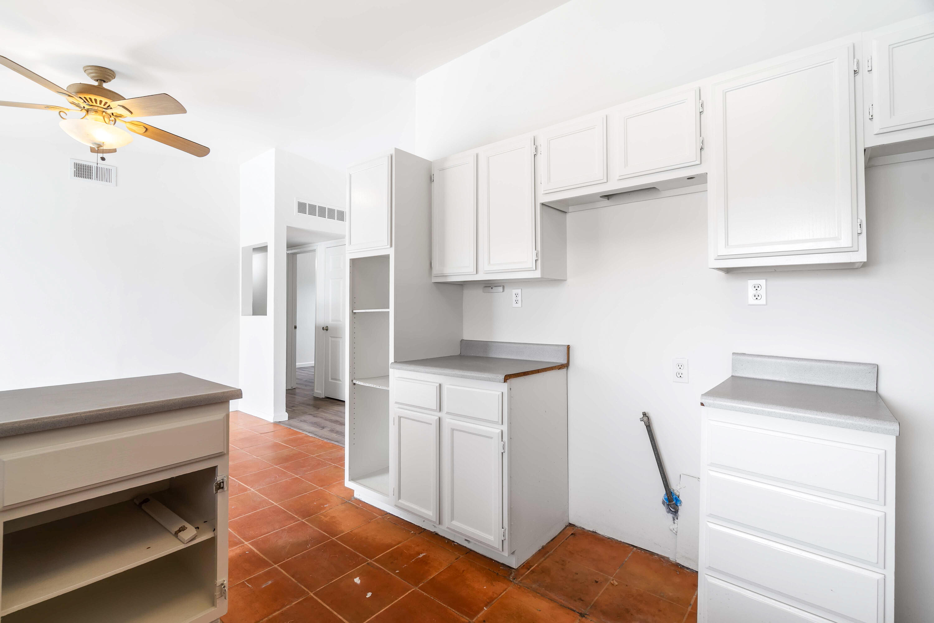 43831 Joshua Road Palm Desert, CA 92260 - Photo 10 of 42 a kitchen with a sink cabinets and appliances
