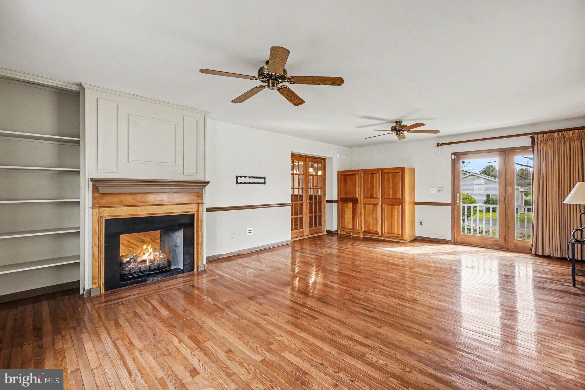 101 Lincoln Avenue Elkton, MD 21921 - Photo 12 of 71 16'X23' Family Room includes 2-Sided Gas Fireplace
