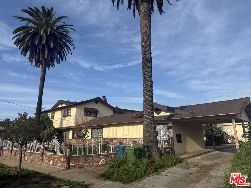 904 North 1st Street Alhambra, CA 91801 - Photo 1 of 17 a front view of a house with balcony
