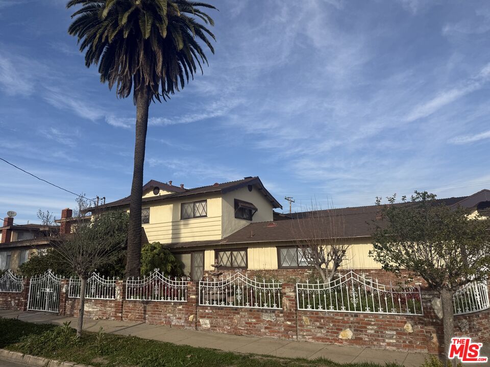 904 North 1st Street Alhambra, CA 91801 - Photo 2 of 17 a front view of a house with yard and garage