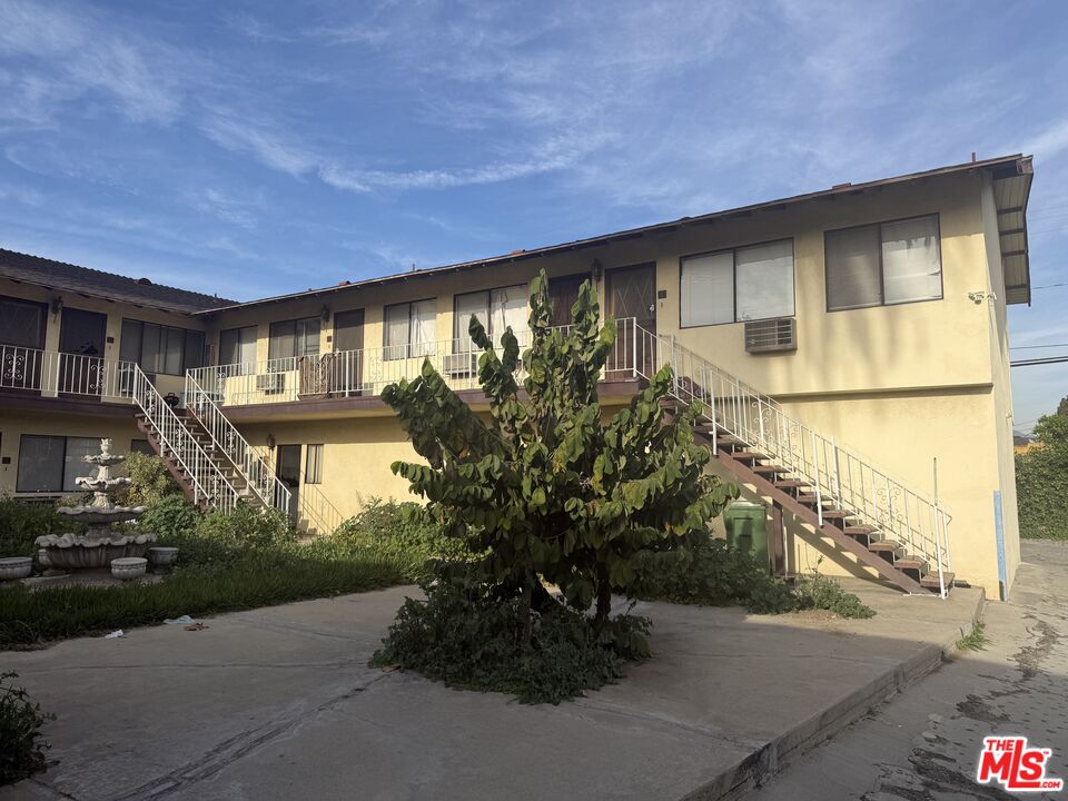 904 North 1st Street Alhambra, CA 91801 - Photo 3 of 17 a front view of a house with a yard