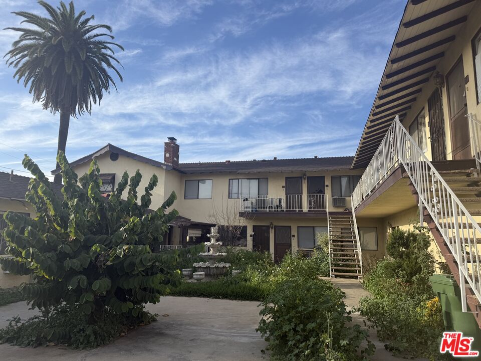 904 North 1st Street Alhambra, CA 91801 - Photo 4 of 17 a front view of a house with a garden