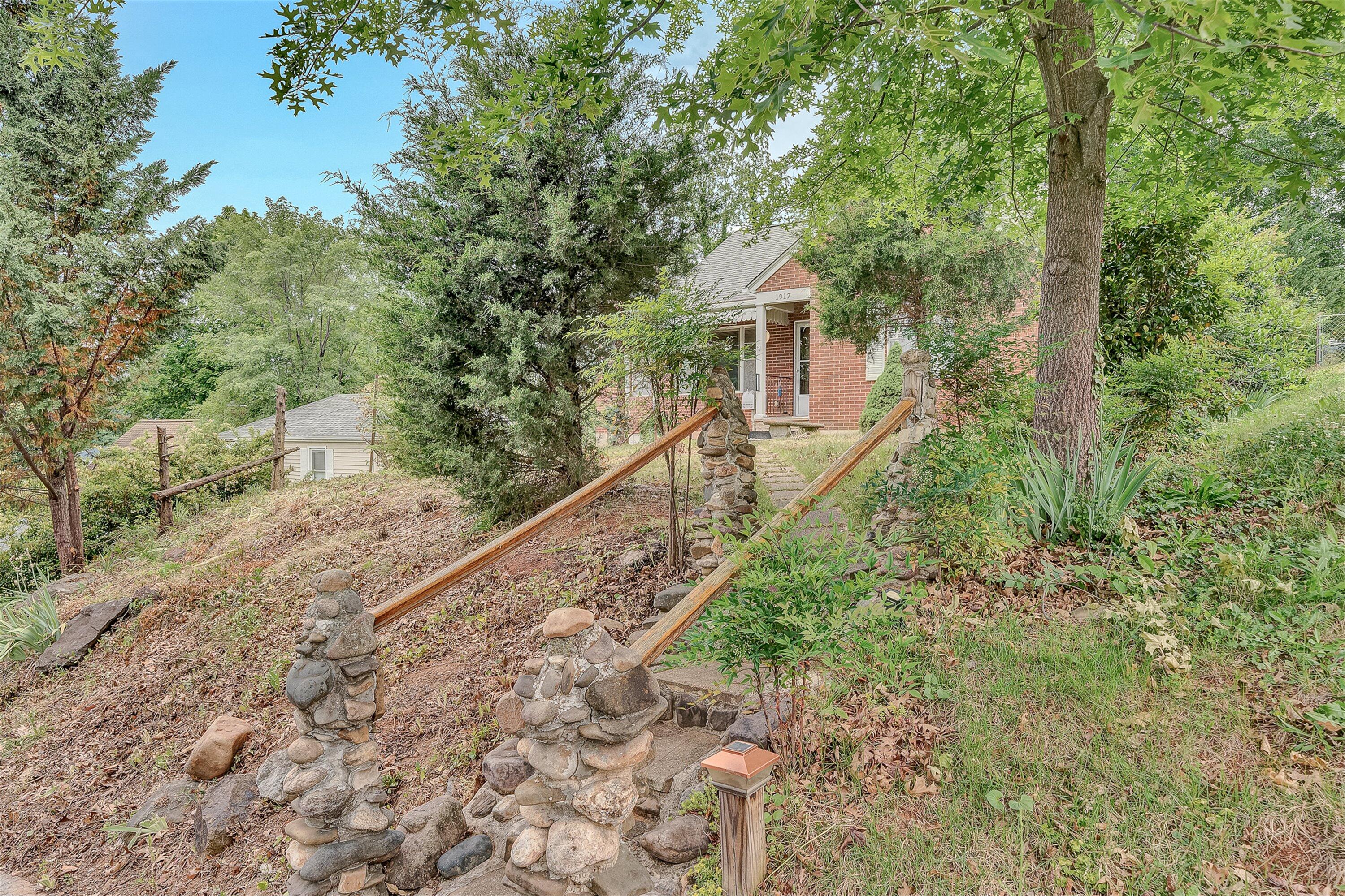 1917 Langdon Road Southwest Roanoke, VA 24015 - Photo 40 of 42 a front view of a house with a yard