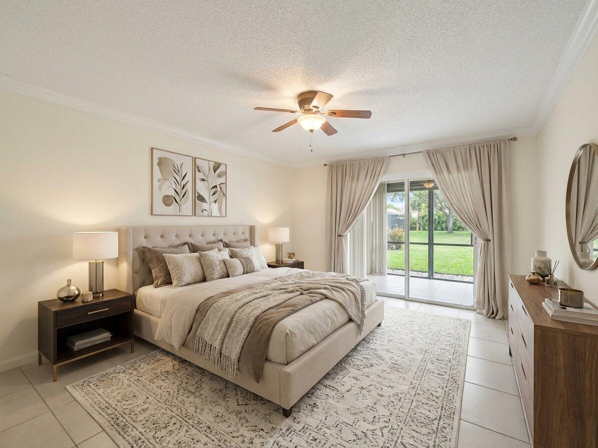 9220 Southwest 14th Street, Unit 3103 Boca Raton, FL 33428 - Photo 14 of 27 a bedroom with a bed and a tv on dresser