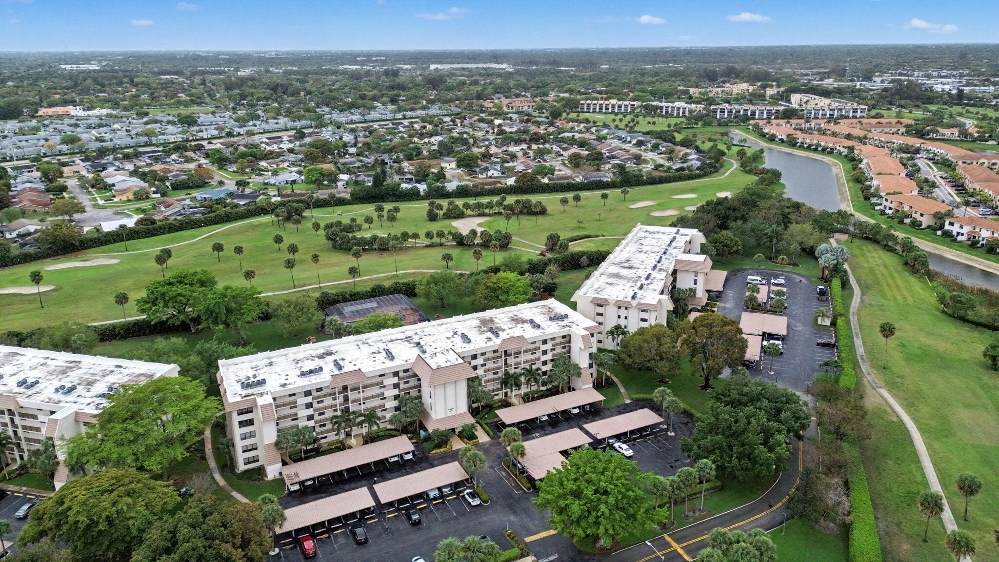 9220 Southwest 14th Street, Unit 3103 Boca Raton, FL 33428 - Photo 25 of 27 an aerial view of a house with a garden