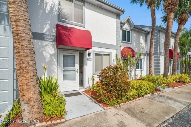 a front view of a multi story residential apartment building