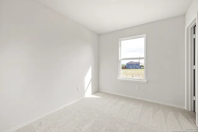 an empty room with a window