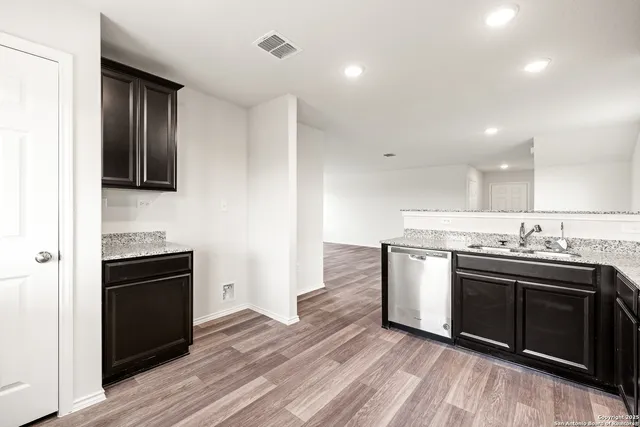 a kitchen with a stove and a microwave