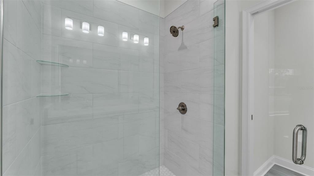 1640 Pearce Road Winter Haven, FL 33881 - Photo 20 of 33 a bathroom with a shower