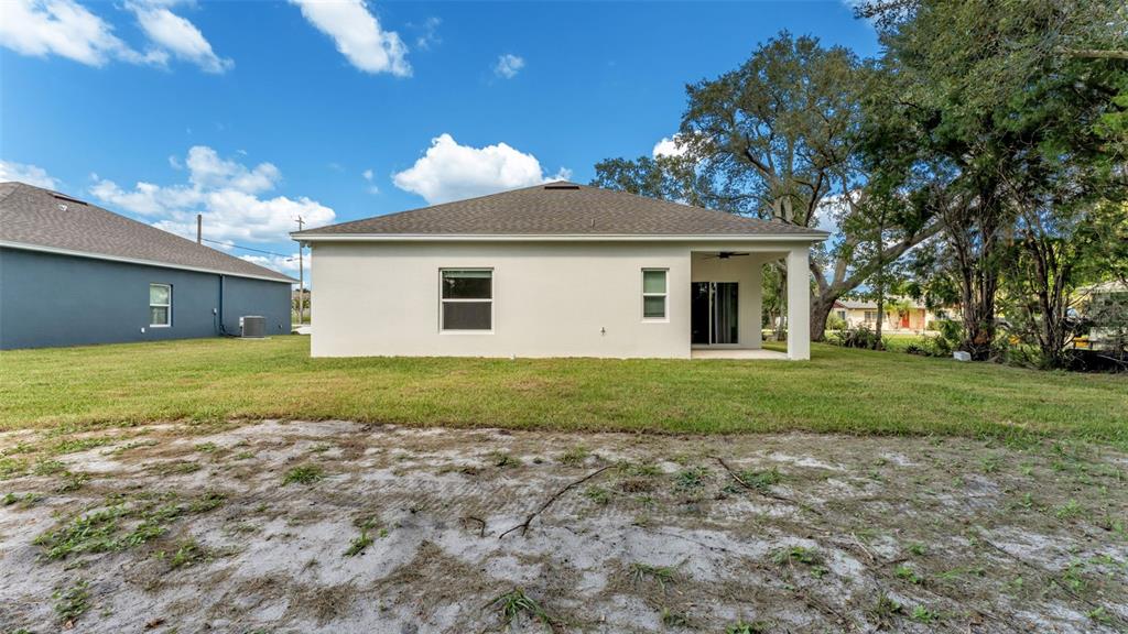 1640 Pearce Road Winter Haven, FL 33881 - Photo 26 of 33 a view of a house with a yard