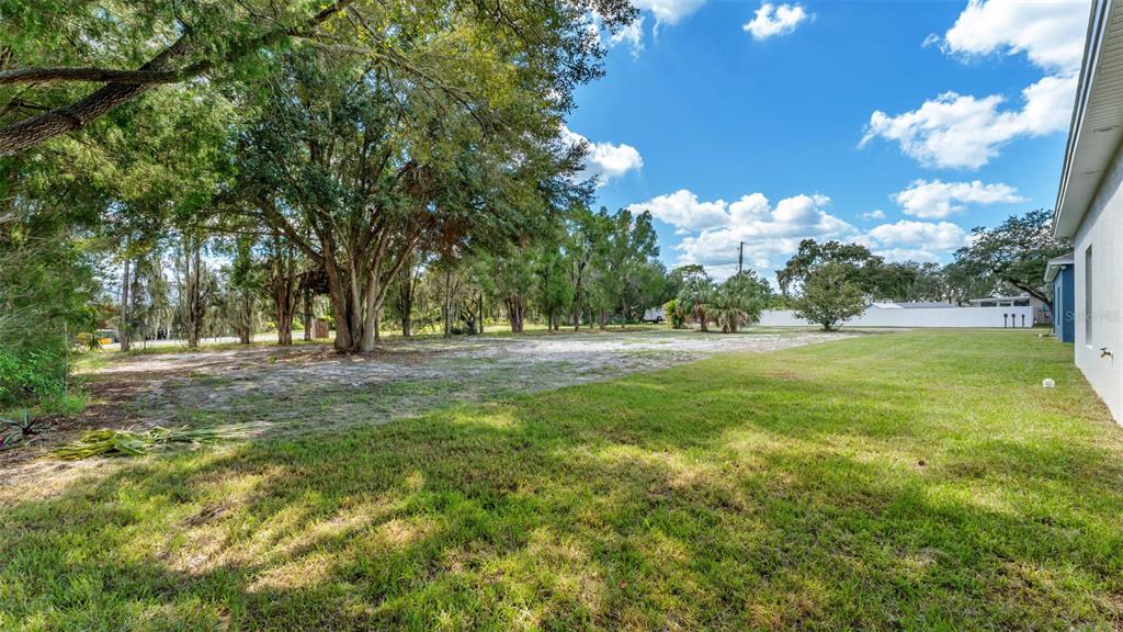 1640 Pearce Road Winter Haven, FL 33881 - Photo 28 of 33 a view of grassy field with trees