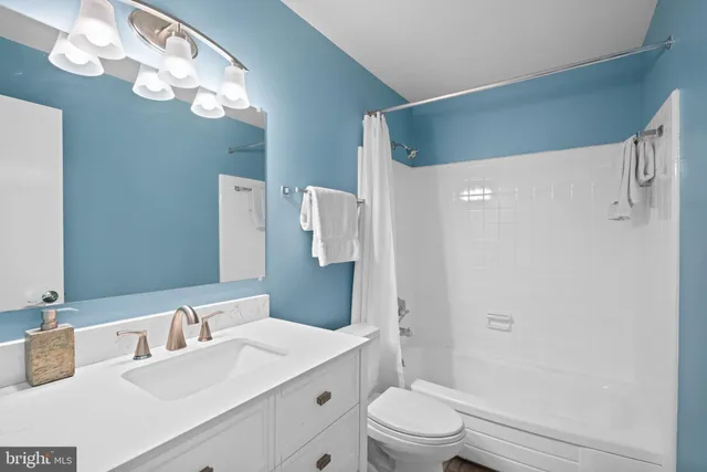 a view of a living room and dining room