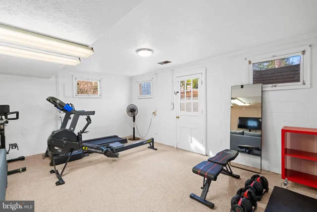 a view of a yard with wooden floor