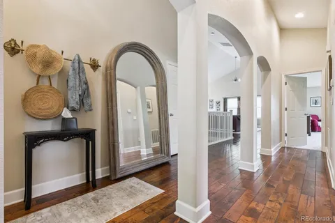 a view of entryway with wooden floor
