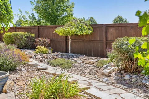 a backyard of a house with lots of green space