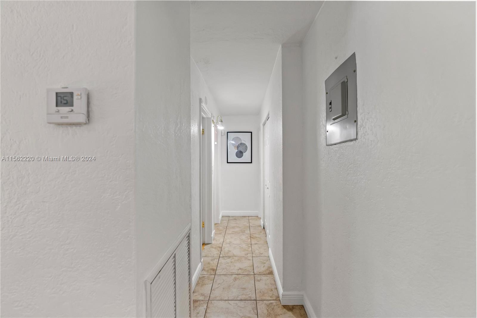 8617 Southwest 68th Court, Unit 24 Pinecrest, FL 33156 - Photo 12 of 22 a view of a hallway