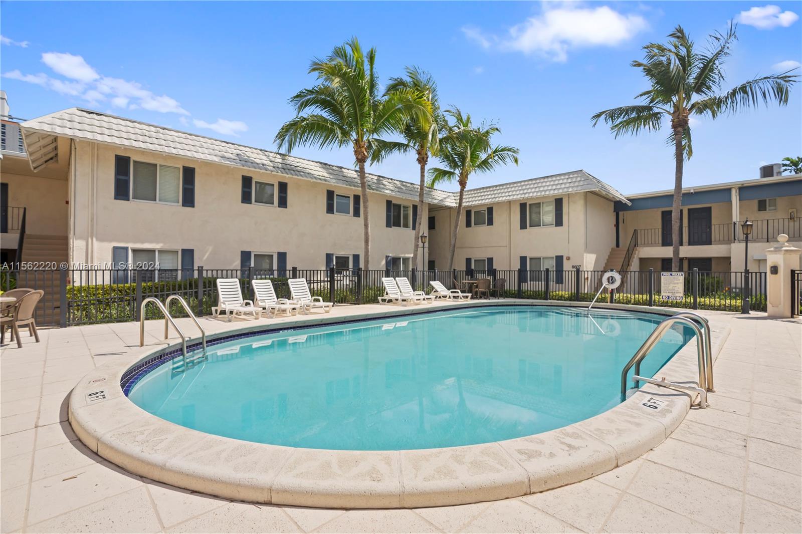 8617 Southwest 68th Court, Unit 24 Pinecrest, FL 33156 - Photo 20 of 22 a view of outdoor space yard swimming pool and patio