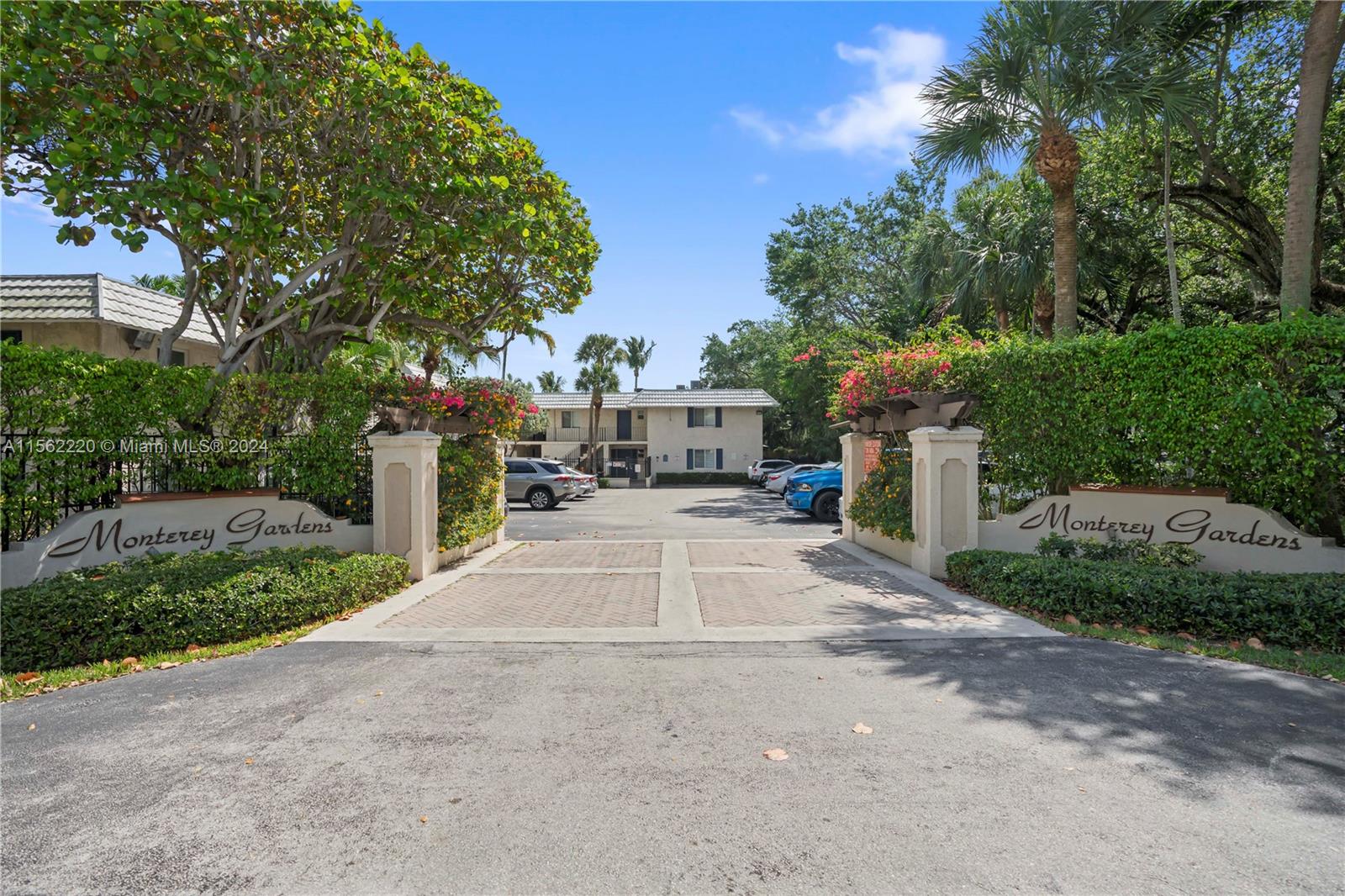 8617 Southwest 68th Court, Unit 24 Pinecrest, FL 33156 - Photo 22 of 22 a view of a street with a building in the background