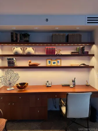 a kitchen with a table and cabinets