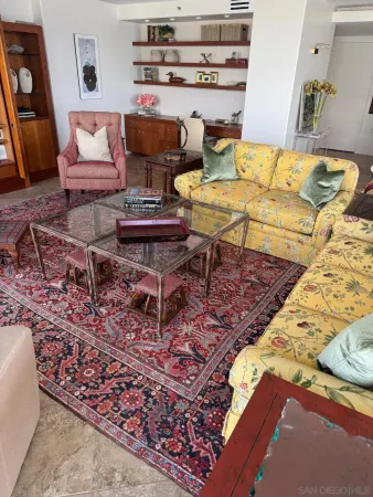 a living room with a couch and a table