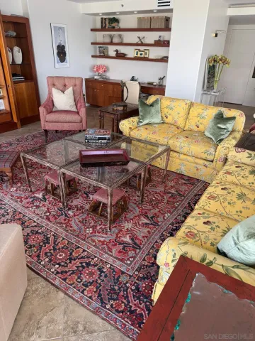 a living room with a couch and a table