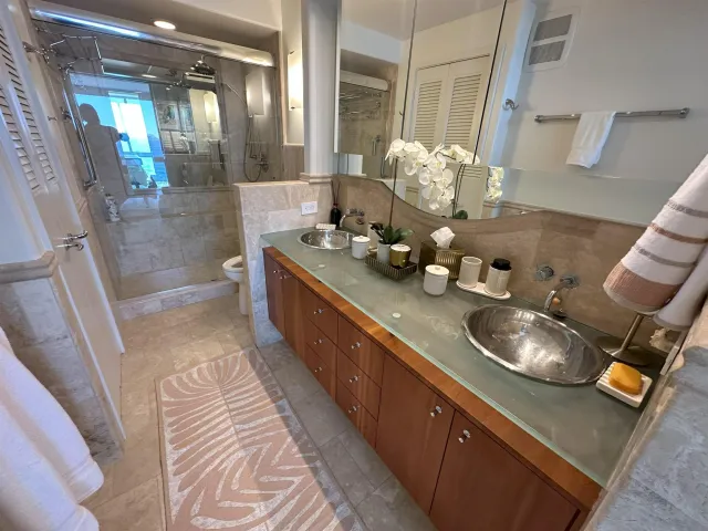 a bathroom with sink and mirror