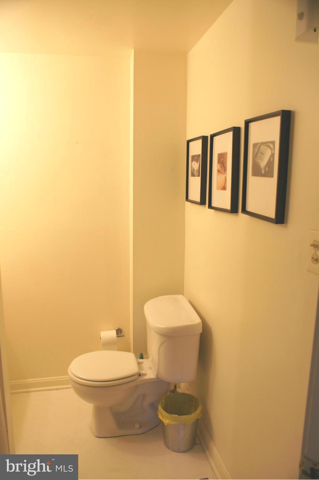 1822 Potomac Road Edgewater, MD 21037 - Photo 22 of 30 a white toilet sitting next to a white wall