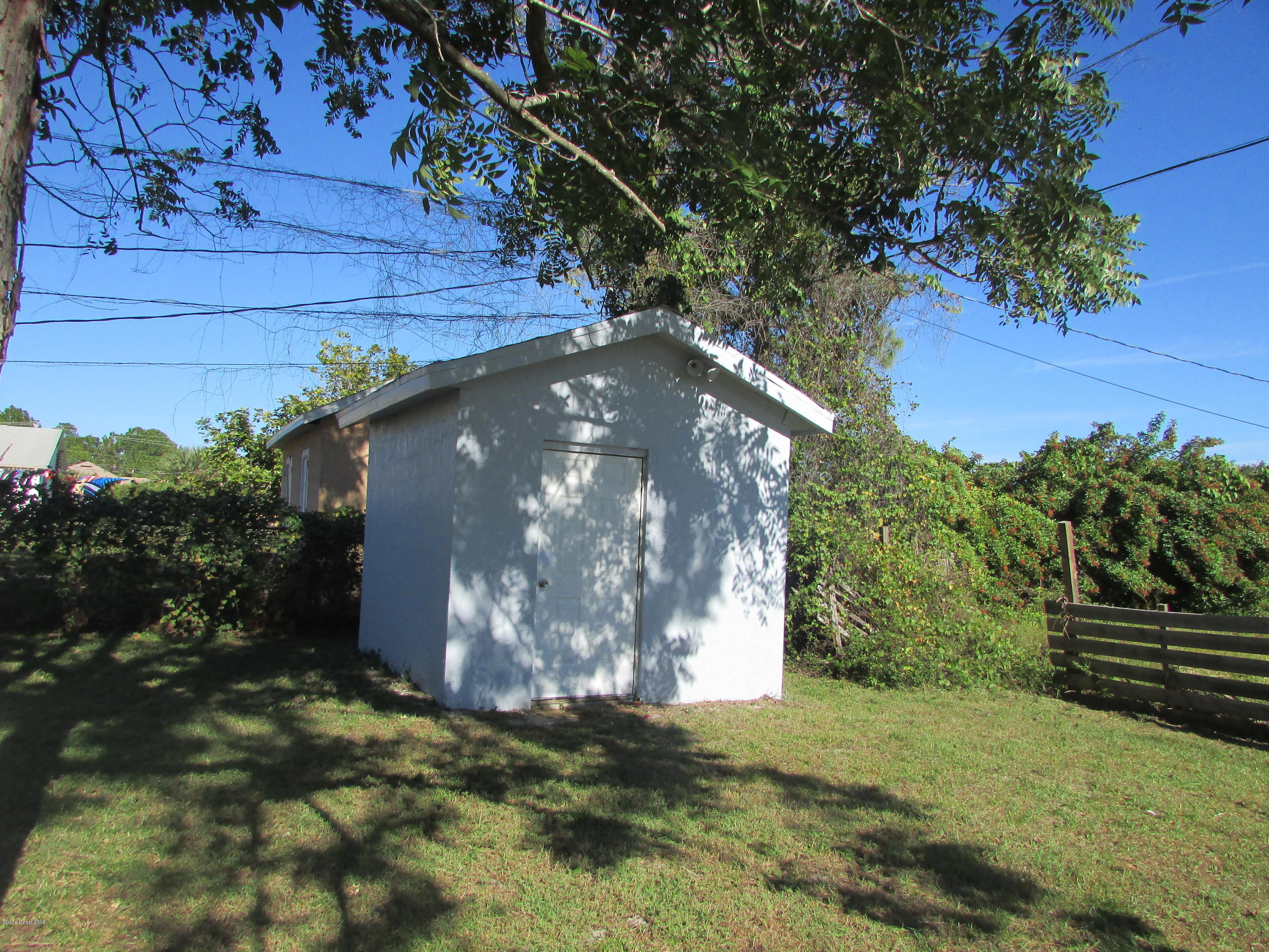 571 Degroodt Road Southwest Palm Bay, FL 32908 - Photo 10 of 12 SHED IN REAR OF PROPERTY