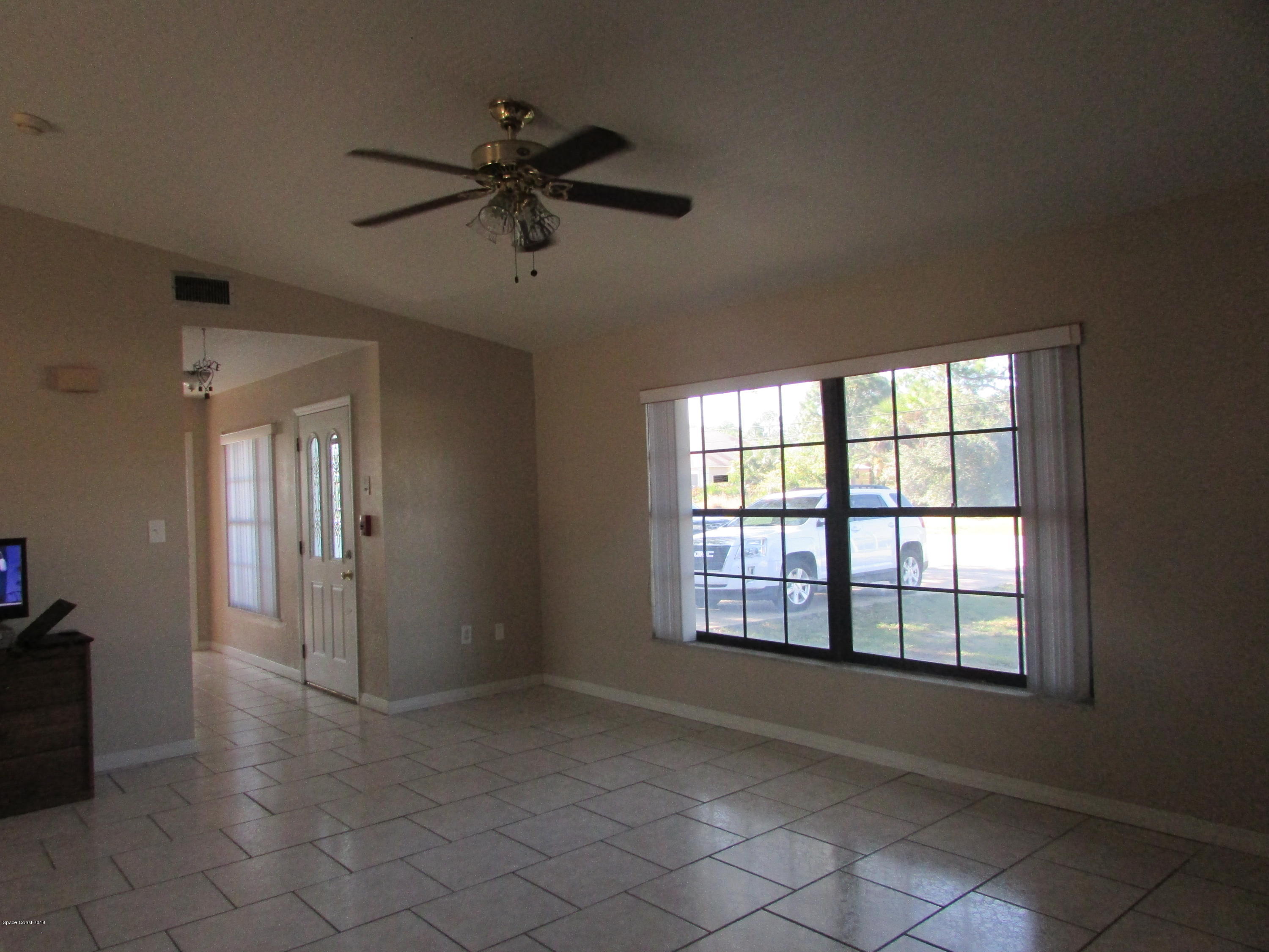 571 Degroodt Road Southwest Palm Bay, FL 32908 - Photo 5 of 12 LIVING ROOM