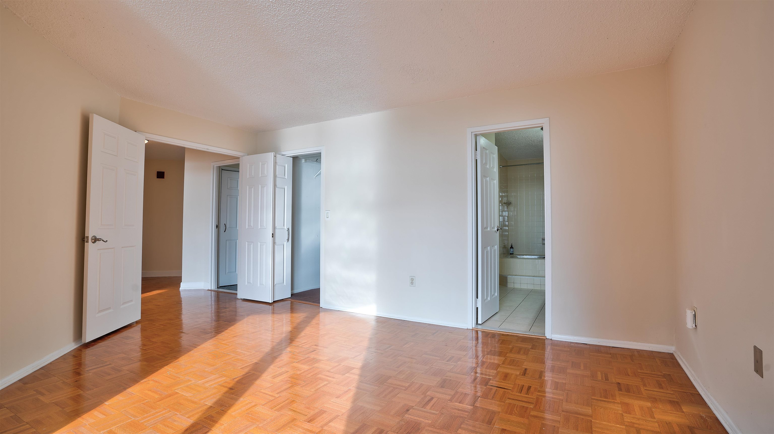 720 Harmon Cove Tower, Unit 720 Secaucus, NJ 07094 - Photo 21 of 49 a view of empty room with wooden floor