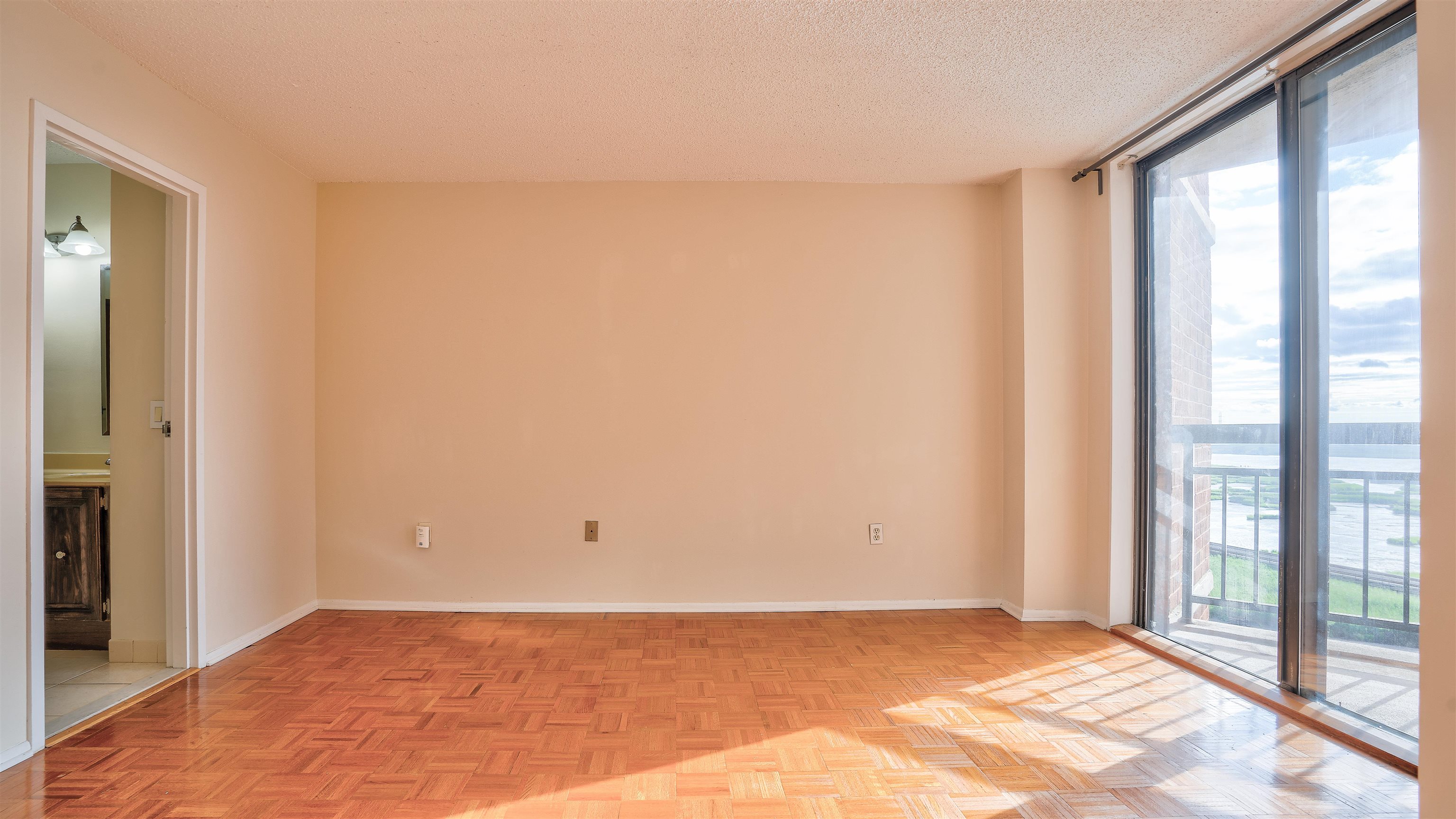 720 Harmon Cove Tower, Unit 720 Secaucus, NJ 07094 - Photo 22 of 49 a view of an empty room and window