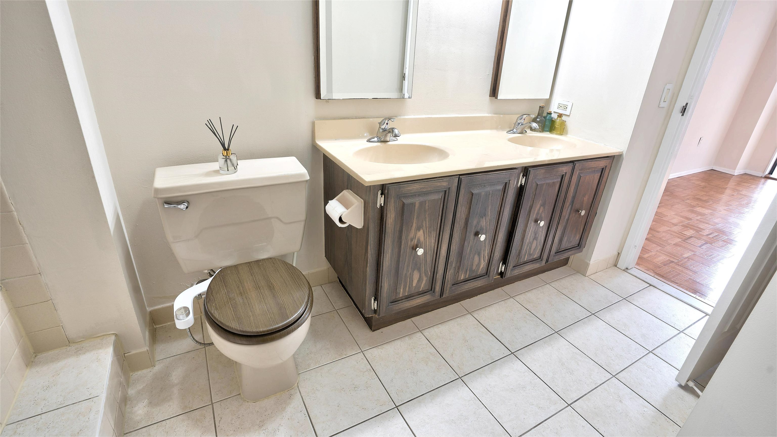 720 Harmon Cove Tower, Unit 720 Secaucus, NJ 07094 - Photo 24 of 49 a bathroom with a sink toilet and mirror