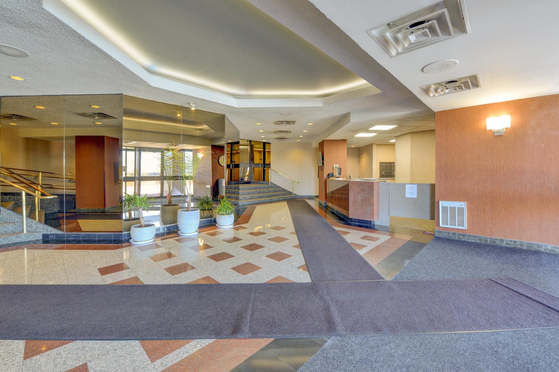 720 Harmon Cove Tower, Unit 720 Secaucus, NJ 07094 - Photo 43 of 49 a view of a living room and kitchen
