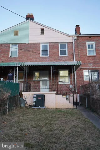 a front view of a house with a porch