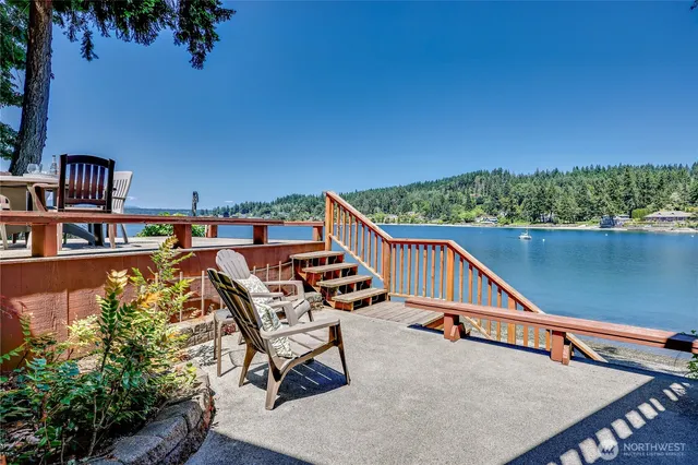 a view of a balcony with chairs