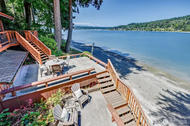 a view of a balcony with chairs