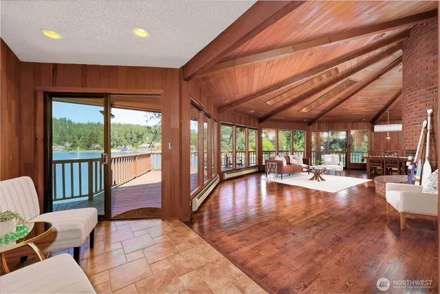 a view of swimming pool with seating area