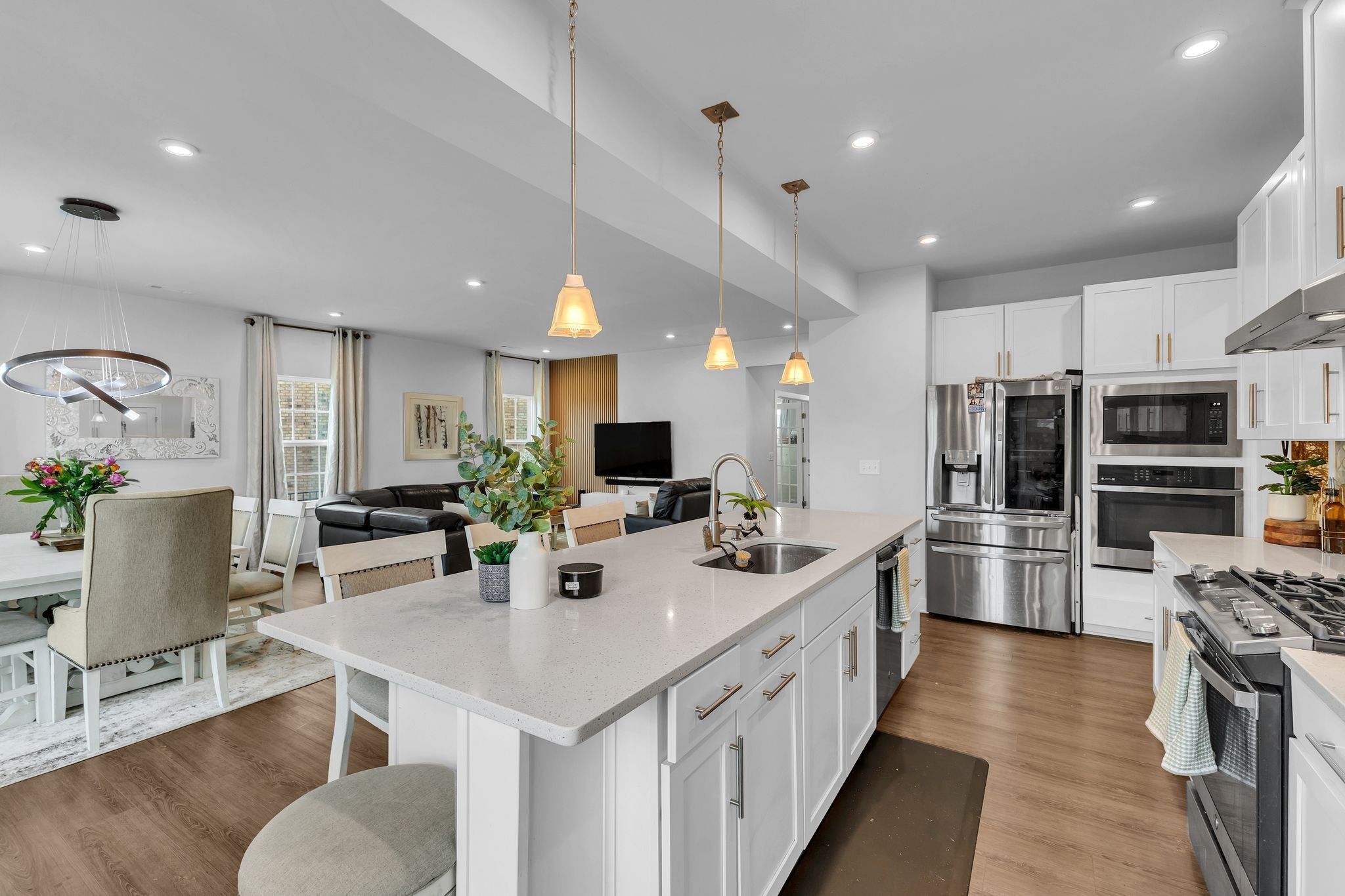 308 Finnegan Ct Spring Hill Spring Hill, TN 37174 - Photo 11 of 35 a kitchen with refrigerator and chairs