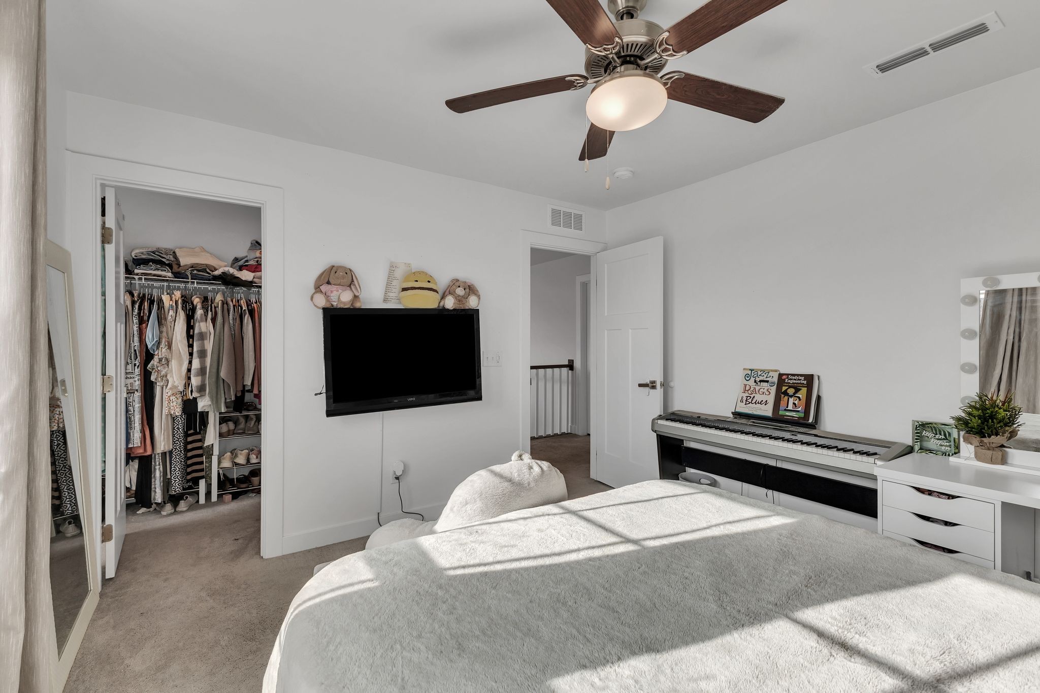 308 Finnegan Ct Spring Hill Spring Hill, TN 37174 - Photo 24 of 35 a bedroom with a bed and a flat screen tv