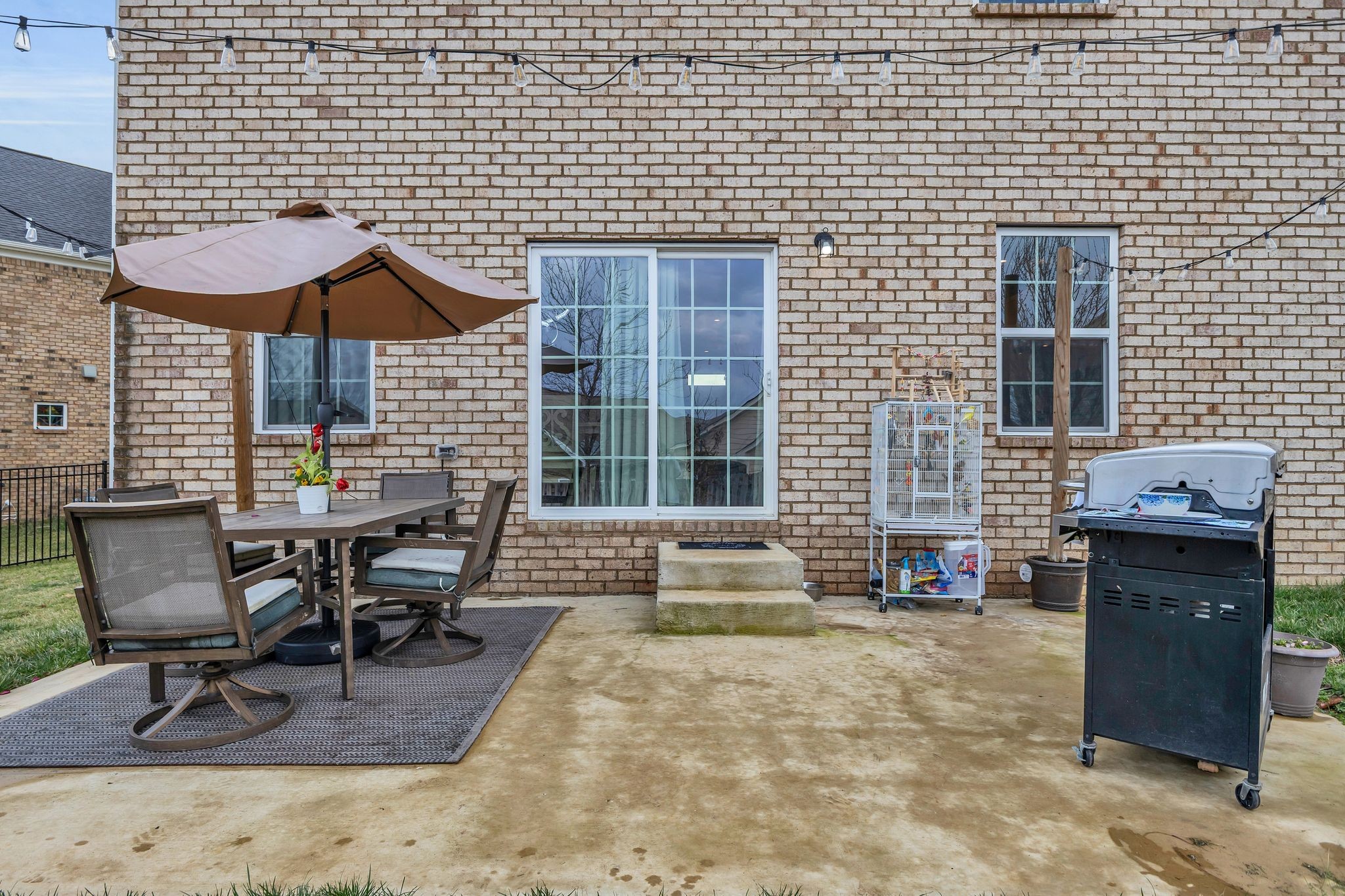308 Finnegan Ct Spring Hill Spring Hill, TN 37174 - Photo 29 of 35 a view of a patio with a table and chairs