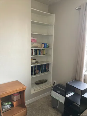 a room with furniture and a window