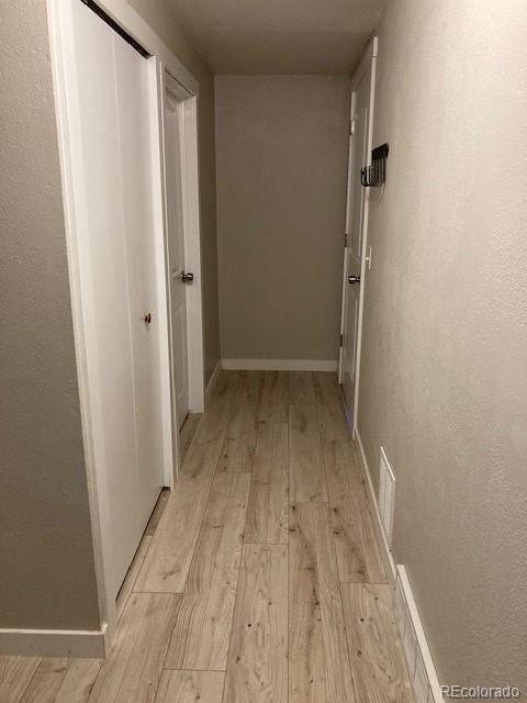 102 Third Street Berthoud, CO 80513 - Photo 27 of 35 a view of a room with wooden floor and entrance