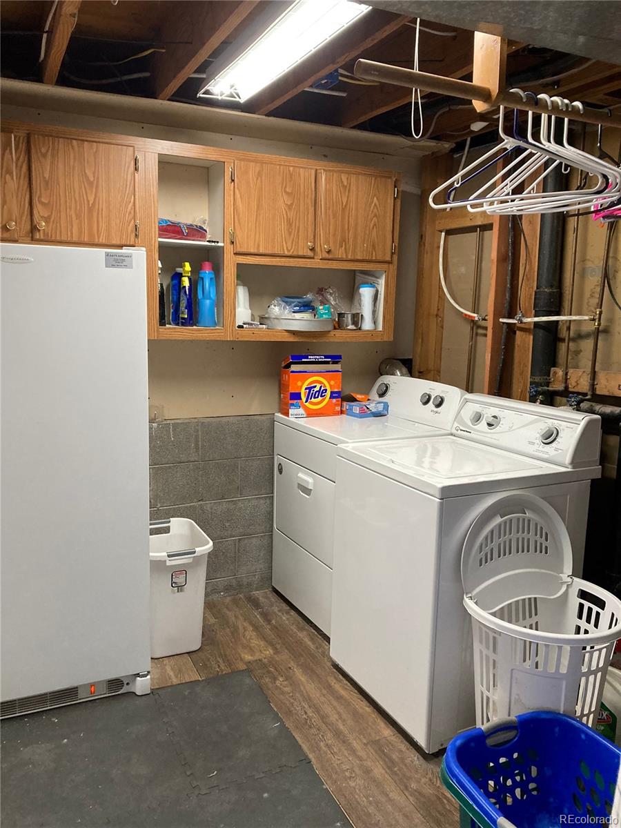 102 Third Street Berthoud, CO 80513 - Photo 33 of 35 a utility room with dryer and washer