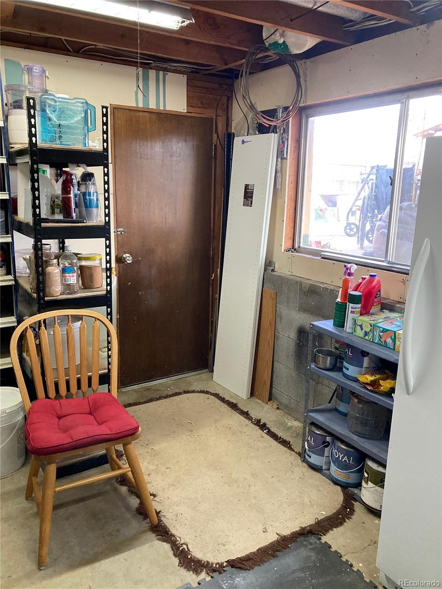 102 Third Street Berthoud, CO 80513 - Photo 34 of 35 a room with furniture and window