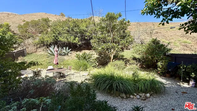 a view of outdoor space and yard
