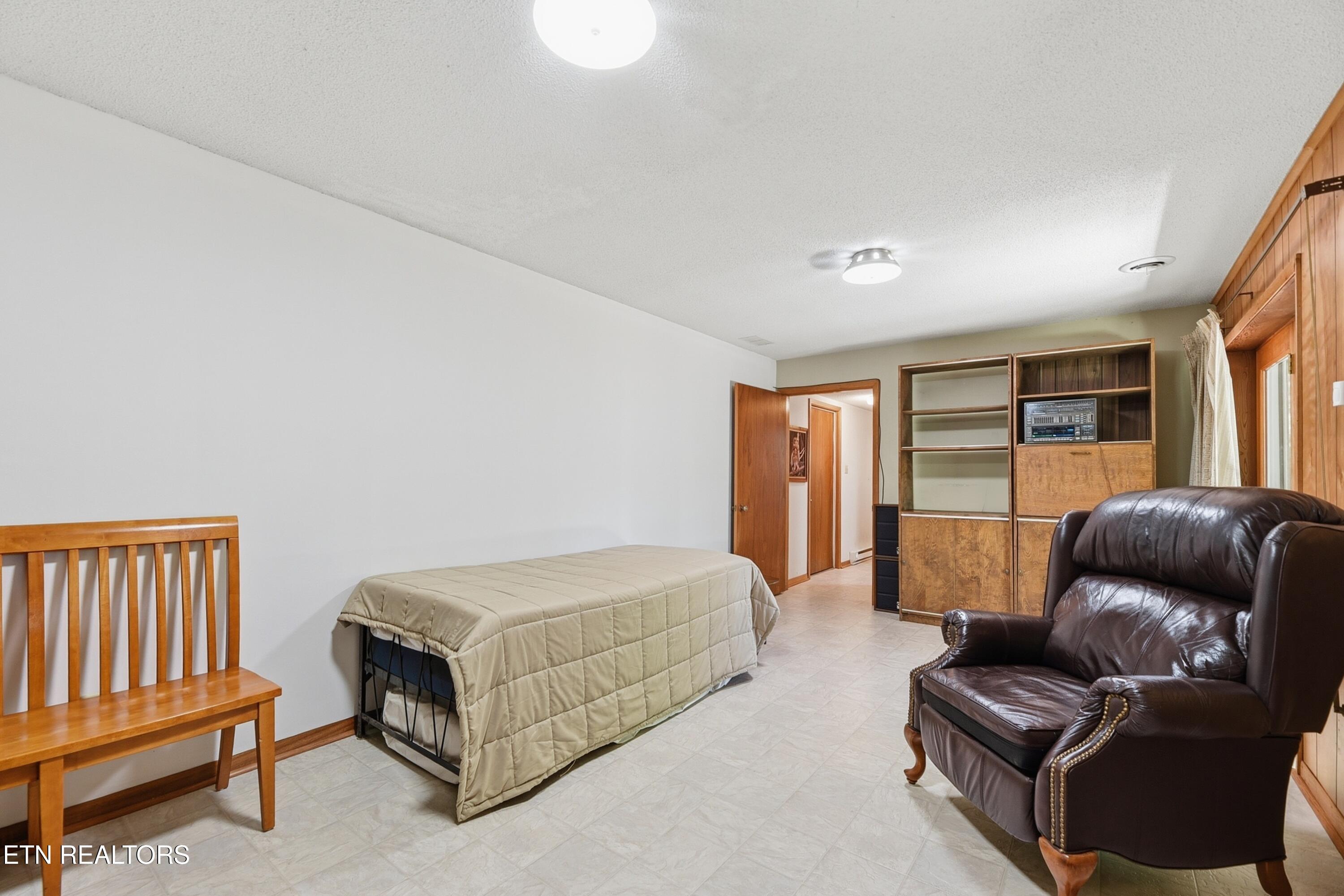221 Sherwood Road Powell, TN 37849 - Photo 28 of 40 Basement Rec Room